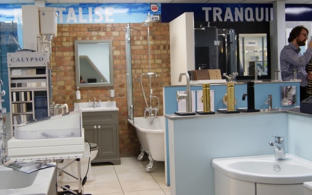 16 - Plumb Inn Bathroom Showroom - Corner Vanity Unit, Basin Mixers and Calypso Tile Display